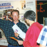 adam hardin at county fair booth1994